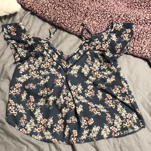 Size: small, blue floral blouse. Very flowy and comfortable material!